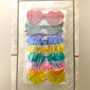 8 pack multi colored heart shape glasses.